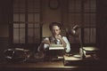 1950s journalist in his office late at night