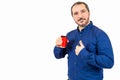 40s man holding tin can with soda on white background Royalty Free Stock Photo