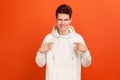 It`s me! Ambitious young man in casual style hoodie with toothy smile on face pointing fingers on himself, confident teenager