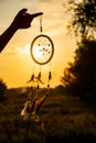 It`s a native American dream catcher and rays of the sunset. Beautiful calming scenery