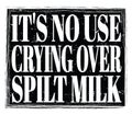 IT`S NO USE CRYING OVER SPILT MILK, text on black stamp sign