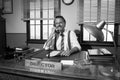 1950s office: director working on the phone Royalty Free Stock Photo