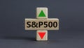 S and P 500 Index symbol. A cube with an arrow that symbolizing that the S and P 500 Index is changing the trend, goes up instead