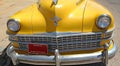 An ancient Chrysler yellow cab Taxi from the 1940\'s