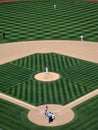 A's Pitcher sets to throw to Reds Batter