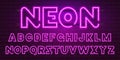 80 s purple neon retro font. Futuristic chrome letters. Bright Alphabet on dark background. Light Symbols Sign for night Royalty Free Stock Photo