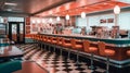 1970\'s retro style diner with checkered floor and red stools. Empty business with no people Royalty Free Stock Photo