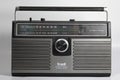 1970s-1980s portable AMFM portable stereo with 8 track cassette player. Flat white background