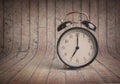 It`s seven o`clock already, time to wake up for breakfast, vintage old black metallic alarm clock Royalty Free Stock Photo
