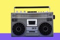 1980s Silver retro radio boom box on color background Royalty Free Stock Photo