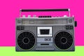 1980s Silver retro radio boom box on color background Royalty Free Stock Photo