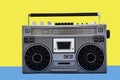 1980s Silver retro radio boom box on color background Royalty Free Stock Photo