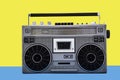 1980s Silver retro radio boom box on color background