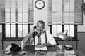 1950s smiling businessman on the phone Royalty Free Stock Photo