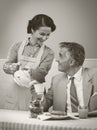 1950s style couple having breakfast Royalty Free Stock Photo