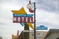 A 1950s style neon sign in the daytime reads Ã¯Â¿Â½Santa Fe Motel with color TVÃ¯Â¿Â½ in Tehachapi, California