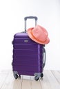 It`s summer time. Travel bag and straw hat. Royalty Free Stock Photo