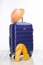 It`s summer time. Travel bag and straw hat Royalty Free Stock Photo