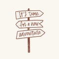 It`s Time For A New Adventure inspirational phrase handwritten with elegant cursive font on signpost or guidepost Royalty Free Stock Photo