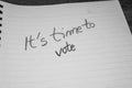 It`s time to vote, handwriting text on paper, political message. Political text on office agenda. Concept of democracy, voting,