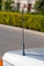 It\'s a vintage car antenna. Metal car antenna