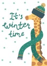 It`s winter time. Charming giraffe wearing a hat and scarf