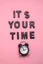 its your time inscription and black clock on a pastel pink background, coaching and success motivational minimal poster concept Royalty Free Stock Photo