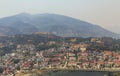 Sa Pa landscape with city, mountains, fog and trees the view from above from Sam Bay Cloud Yard in summer at Ham Rong Mountain. Royalty Free Stock Photo