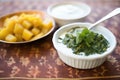 saag aloo with a dollop of yogurt on top Royalty Free Stock Photo