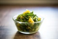 saag aloo in a glass bowl with backlighting Royalty Free Stock Photo