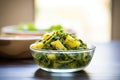 saag aloo in a glass bowl with backlighting Royalty Free Stock Photo