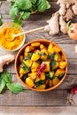 Saag Aloo, Indian style spinach and potatoes in cast iron pan. Top view Royalty Free Stock Photo