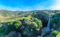 Saar Waterfall, with Mount Hermon and Nimrod Fortress Royalty Free Stock Photo