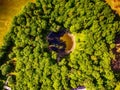 Saarema Island, Estonia: aerial top view the main meteorite crater in the village of Kaali