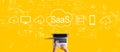 SaaS - software as a service concept with person working with laptop