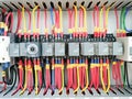Selective focus image with noise effect a row various type of electrical relays. Royalty Free Stock Photo