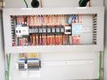 Selective focus image with noise effect a row various type of electrical relays. Royalty Free Stock Photo