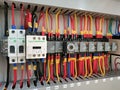 Selective focus image with noise effect a row various type of electrical relays. Royalty Free Stock Photo
