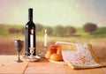 Sabbath image. challah bread and candelas on wooden table