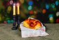 Sabbath image. challah bread, sabbath wine and candelas on wooden table. glitter overlay Royalty Free Stock Photo