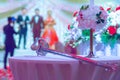 Saber sword or rapier on the table in wedding party. focused on handle.