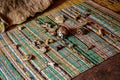 Traditional Healer known as a Sangoma or witch-doctor performing a spiritual reading with bones and shells