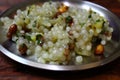 Sabudana khichdi on steel plate Royalty Free Stock Photo