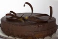 The Sacher cake, Sachertorte. Austrian chocolate cake, consisting of two plates of chocolate sponge cake and a thin Royalty Free Stock Photo