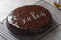 Sacher cake. Traditional Austrian chocolate dessert. Homemade baking. Selective focus, close-up Royalty Free Stock Photo