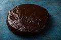 Sacher cake. Traditional Austrian chocolate dessert. Homemade baking. Selective focus, close-up Royalty Free Stock Photo