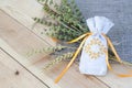 Sachet with ukrainian embroidery, sheaf of wheat and dried herbs Royalty Free Stock Photo