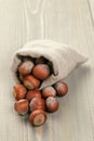 Sack bag full of hazelnuts, rustic style photo
