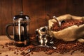 Sack of coffee beans with french press