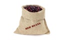 A sack of red kidney beans isolated on a white background. Haricot beans in burlap saks. Kidney beans in jute bag Royalty Free Stock Photo